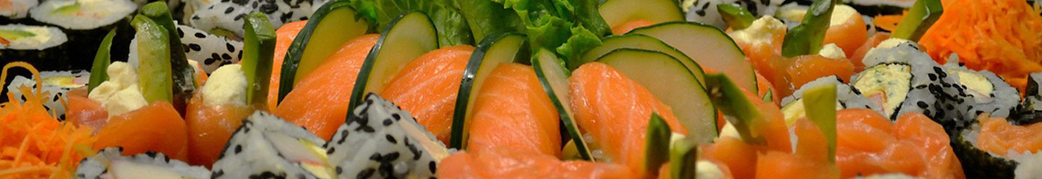 Eating Japanese Sushi at Sushi Sen-Nin restaurant in New York, NY.